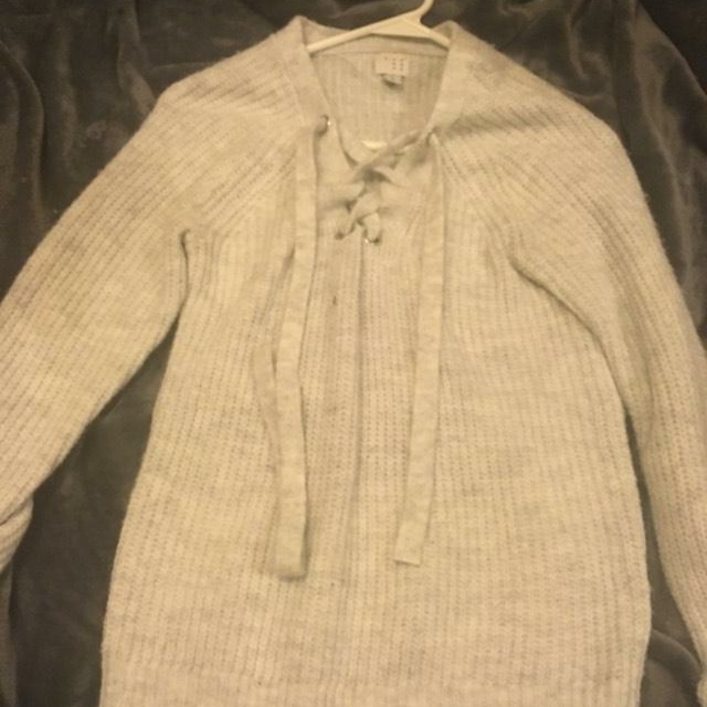 Cross body sweater